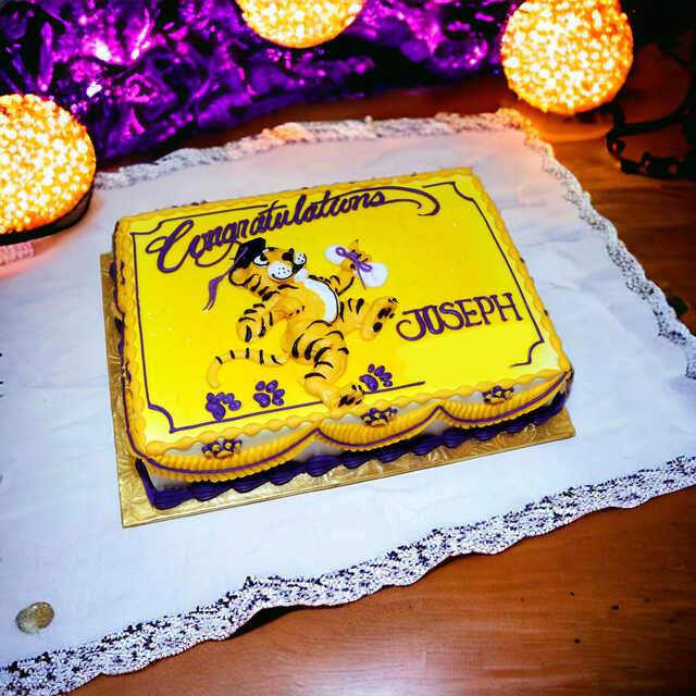 Dancing Tiger Cake with Graduation Cap