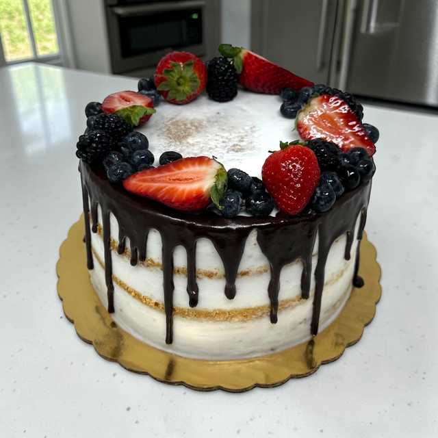 Naked Fresh Berry Chocolate Drip Cake